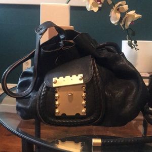 Tracy Teese used shoulder bag in black.